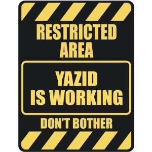   RESTRICTED AREA YAZID IS WORKING  PARKING SIGN