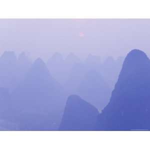  Karst Landscape, Haze and Rising Sun, Yangshuo, Guangxi 