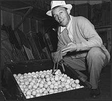   1942 with golf balls for the scrap rubber drive during world war ii