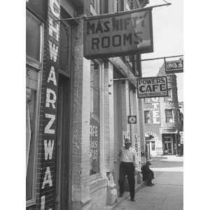  Storefront Signs Advertising Rooms for Rent and a Cafe on 