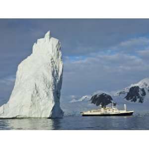 Iceberg and Expedition Ship National Geographic Endeavour, Antarctica 