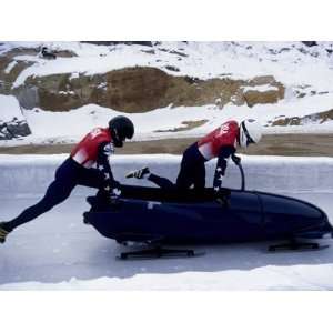 Man Bobsled Team Pushing Off at the Start , Lake placid, New York, USA 