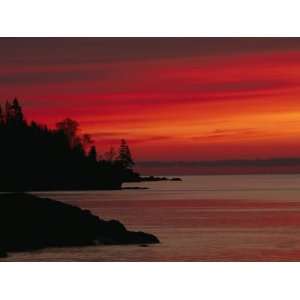 Bright Red Sky over Lake Superior at Dawn with Silhouettes of the 