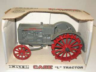 Up for sale is a 1/16 CASE L tractor on steel wheels. New in box. Ertl 