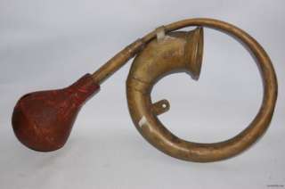 An Antique Brass Classic Car Horn by Deluxe  