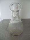 Large Clear Decorative Bottle with arms on each side has cracked glass 