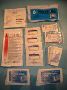   FIRST AID KIT / SURVIVAL KIT WITH LOT OF US ISSUE MEDICAL ITEMS  