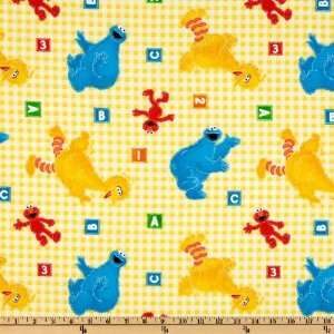  44 Wide Sesame Street Tossed Characters Yellow Fabric By 