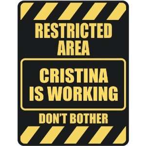   RESTRICTED AREA CRISTINA IS WORKING  PARKING SIGN