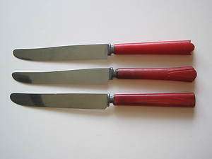   of 3 Bakelite Collectible Assorted Red Handled Butter Knives  