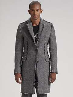   be the first to write a review a fine wool coat updated with raw edges