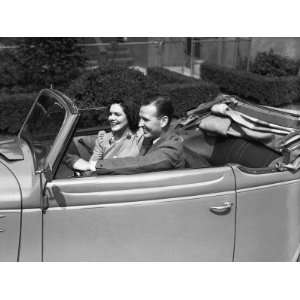  Couple Riding in Old Fashion Convertible Car Photographic 